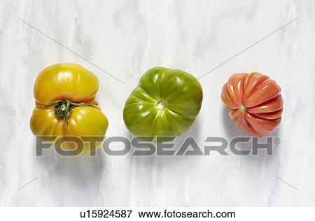Stock Photo - Tomatoes on white background. Fotosearch