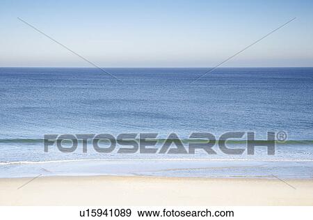 Stock Photo - Tranquil seascape with Nauset Beach at Cape Cod. Fotosearch