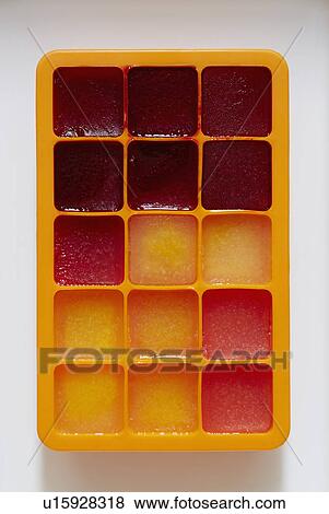 Tray of ice cubes View Large Photo Image Stock Photo - Tray of ice cubes. Fotosearch
