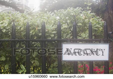 Vacancy sign on hotel's fence View Large Photo Image Stock Image - Vacancy sign on hotel's fence. Fotosearch