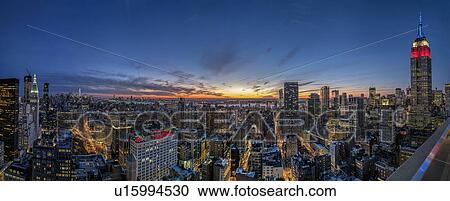 View of Manhattan at dusk View Large Photo Image Stock Image - View of Manhattan at dusk. Fotosearch