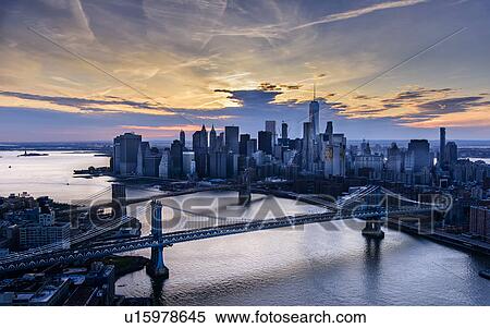 Stock Photography - View of Manhattan at dusk. Fotosearch