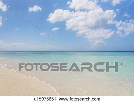 White clouds over tropical sea View Large Photo Image Stock Image - White clouds over tropical sea. Fotosearch
