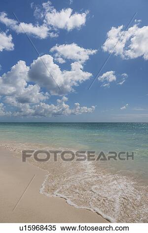 White clouds over tropical sea View Large Photo Image Stock Photography - White clouds over tropical sea. Fotosearch