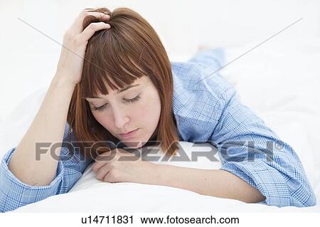 Woman with hand in hair View Large Photo Image Stock Image - Woman with hand in hair. Fotosearch