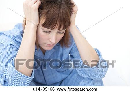 Woman with hands in hair View Large Photo Image Stock Photograph - Woman with hands in hair. Fotosearch