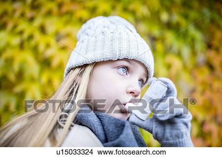 Young girl using inhaler View Large Photo Image Picture - Young girl using inhaler. Fotosearch