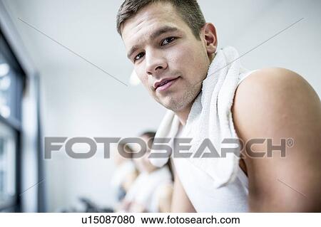 Young man in gym, close-up, portrait View Large Photo Image Stock Image - Young man in gym, close-up, portrait. Fotosearch
