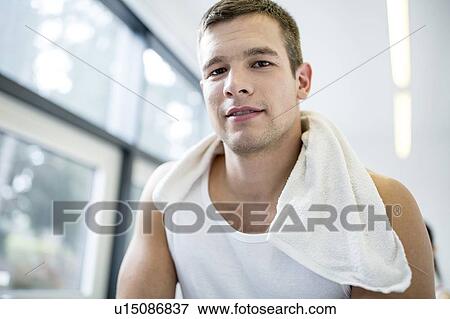 Young man in gym, close-up, portrait View Large Photo Image Stock Photo - Young man in gym, close-up, portrait. Fotosearch
