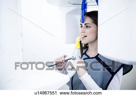 Young woman having dental x-ray View Large Photo Image Stock Image - Young woman having dental x-ray. Fotosearch