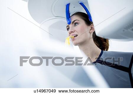 Young woman having dental x-ray View Large Photo Image Stock Photo - Young woman having dental x-ray. Fotosearch