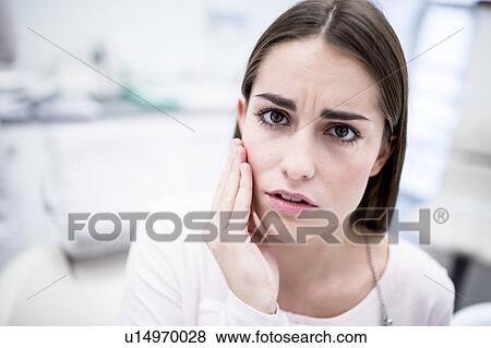 Young woman suffering toothache View Large Photo Image Stock Photo - Young woman suffering toothache. Fotosearch