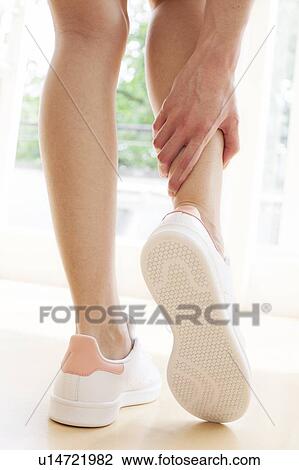 Young woman wearing white trainers View Large Photo Image Stock Image - Young woman wearing white trainers. Fotosearch