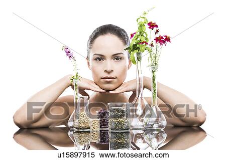 Young woman with vases in foreground View Large Photo Image Stock Photography - Young woman with vases in foreground. Fotosearch