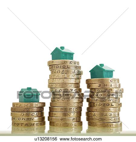 British pound coins with model houses View Large Photo Image Stock Photograph - British pound coins with model houses. Fotosearch