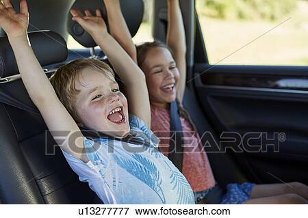 Brother and sister in car View Large Photo Image Stock Photo - Brother and sister in car. Fotosearch