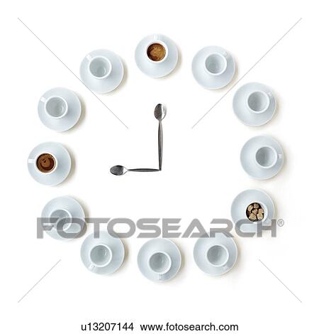 Picture - Coffee cups in the shape of a clock. Fotosearch