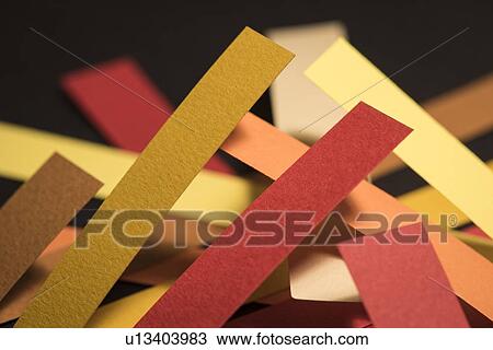 Stock Image - Colourful strips of cardboard. Fotosearch