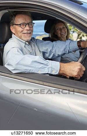 Senior man in car View Large Photo Image Stock Image - Senior man in car. Fotosearch