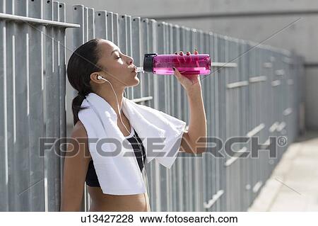 Stock Photo - Woman drinking water. Fotosearch