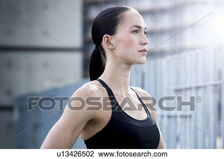 Stock Image - Woman in crop top. Fotosearch