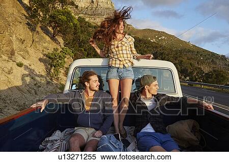 Woman in pick up truck looking at view View Large Photo Image Stock Photography - Woman in pick up truck looking at view. Fotosearch