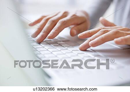 Woman using laptop View Large Photo Image Stock Photograph - Woman using laptop. Fotosearch