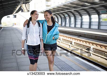 Stock Image - Women in sports clothing. Fotosearch