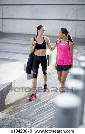 Stock Photo - Women in sports clothing. Fotosearch