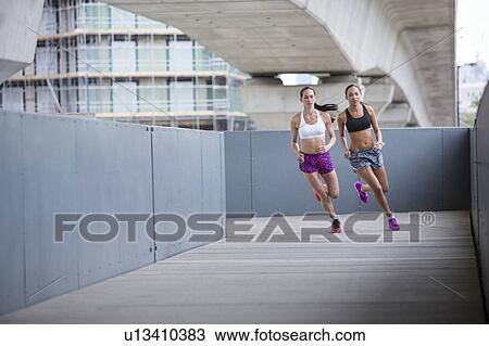 Stock Image - Women racing. Fotosearch