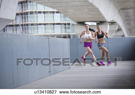 Women racing View Large Photo Image Stock Photo - Women racing. Fotosearch
