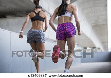 Women running View Large Photo Image Stock Photo - Women running. Fotosearch