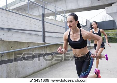 Women running View Large Photo Image Stock Photo - Women running. Fotosearch