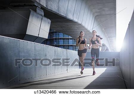 Women running View Large Photo Image Stock Photograph - Women running. Fotosearch
