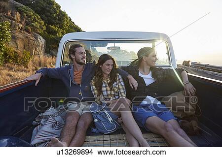Young friends in pick up truck View Large Photo Image Picture - Young friends in pick up truck. Fotosearch