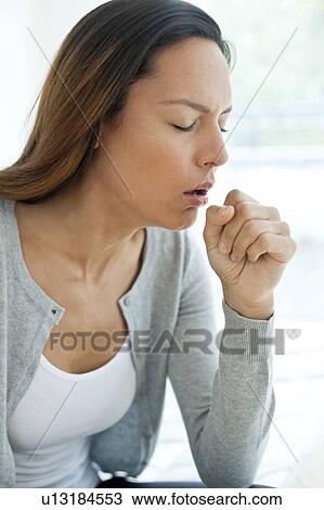 Young woman coughing View Large Photo Image Stock Image - Young woman coughing. Fotosearch