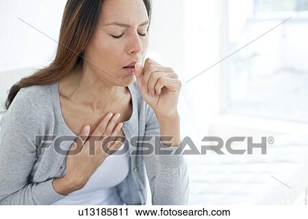 Young woman coughing View Large Photo Image Stock Image - Young woman coughing. Fotosearch