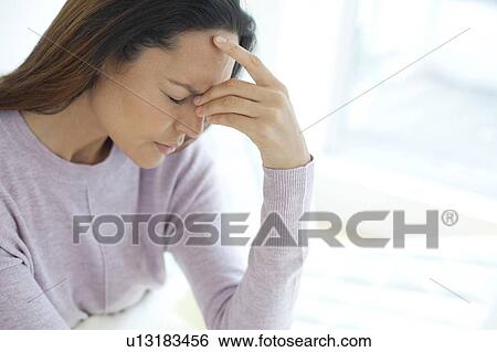 Young woman feeling unwell View Large Photo Image Stock Photograph - Young woman feeling unwell. Fotosearch