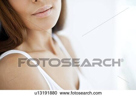 Stock Image - Young woman smiling. Fotosearch