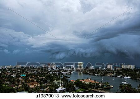 Stock Image - A thunderstorm moving over the Intracoastal Waterway and out to sea at Fort Lauderdale, Florida. Fotosearch