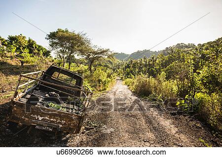 Stock Photograph - Abandoned truck along dirt track, Wana Giri, Bali, Indonesia. Fotosearch