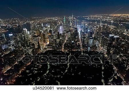 Stock Image - Aerial view from helicopter of Central Park, Empire State Building, New York, USA. Fotosearch