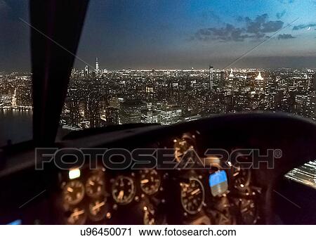 Stock Image - Aerial view from helicopter of Empire State Building, New York, USA. Fotosearch