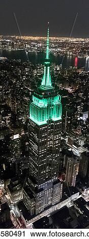 Stock Image - Aerial view from helicopter of Midtown, Empire State Building, New York, USA. Fotosearch