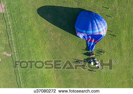 Stock Image - Aerial view hot air balloon on Pitchcroft Racecourse, Worcester, England, UK. Fotosearch