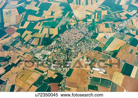 Stock Photography - Aerial view of rural village and fields near Milan, Italy. Fotosearch