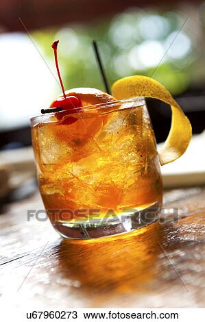Stock Image - Alcoholic drink in glass. Fotosearch
