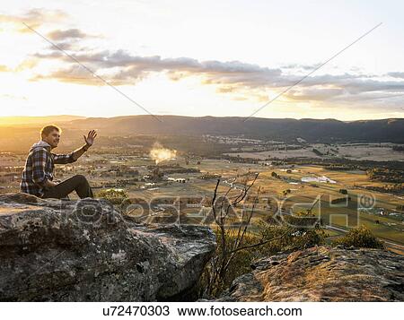 Australia, New South Wales, Man waving on Mount York View Large Photo Image Stock Image - Australia, New South Wales, Man waving on Mount York. Fotosearch