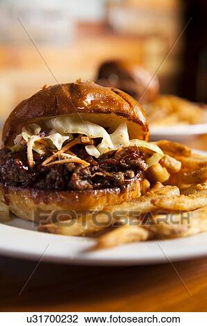 Barbecue sandwich witch coleslaw and french fries View Large Photo Image Stock Image - Barbecue sandwich witch coleslaw and french fries. Fotosearch