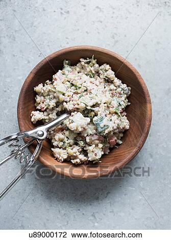 Bulgur salad in wooden bowl with scoop View Large Photo Image Stock Image - Bulgur salad in wooden bowl with scoop. Fotosearch